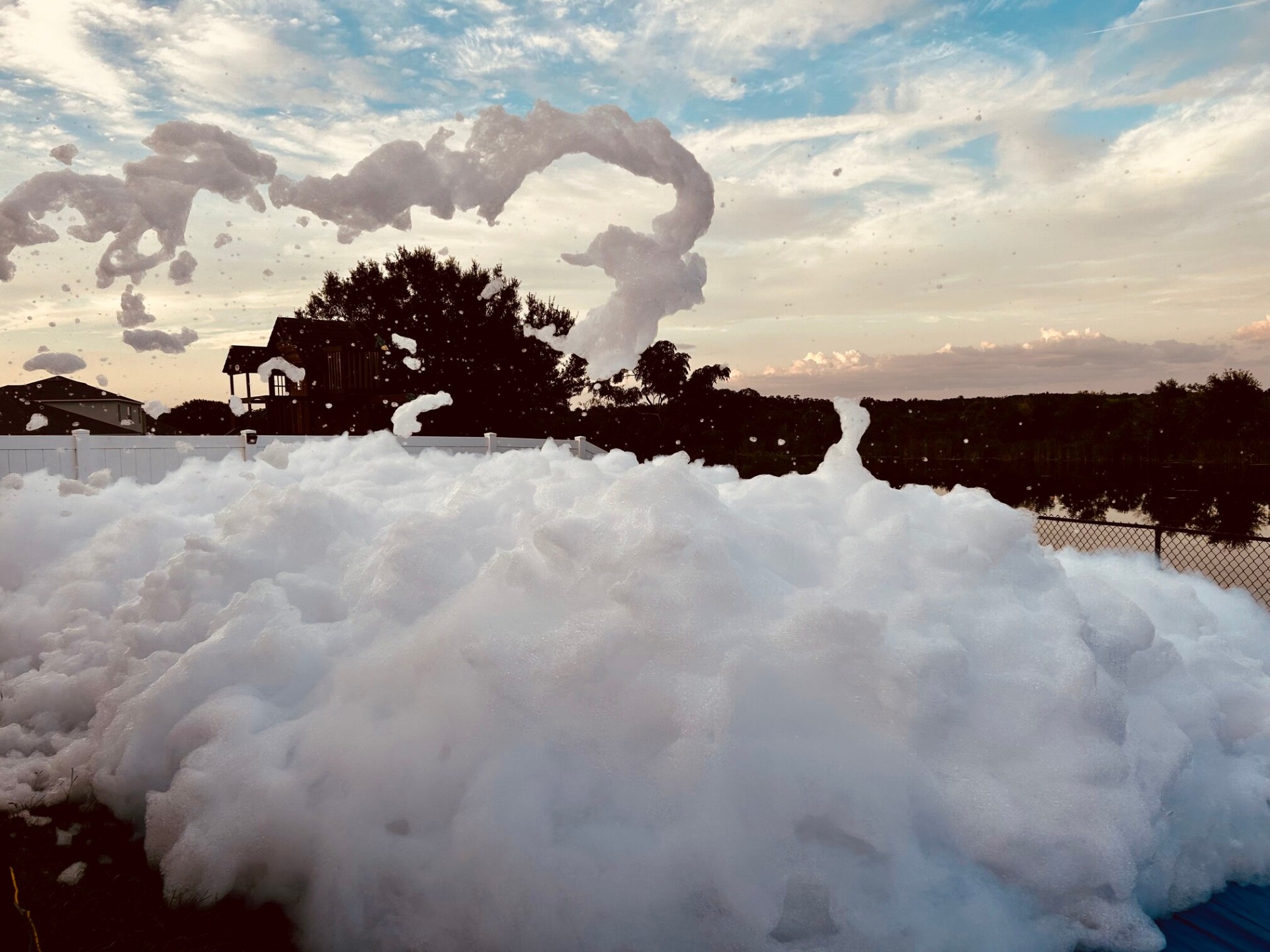 Heart-shaped foam flying through the air at a foam party